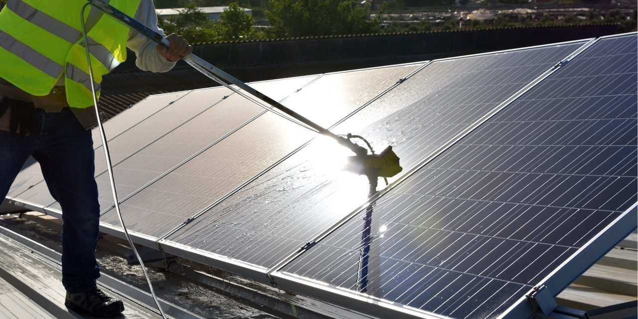Solar panel cleaning on a Dubai rooftop